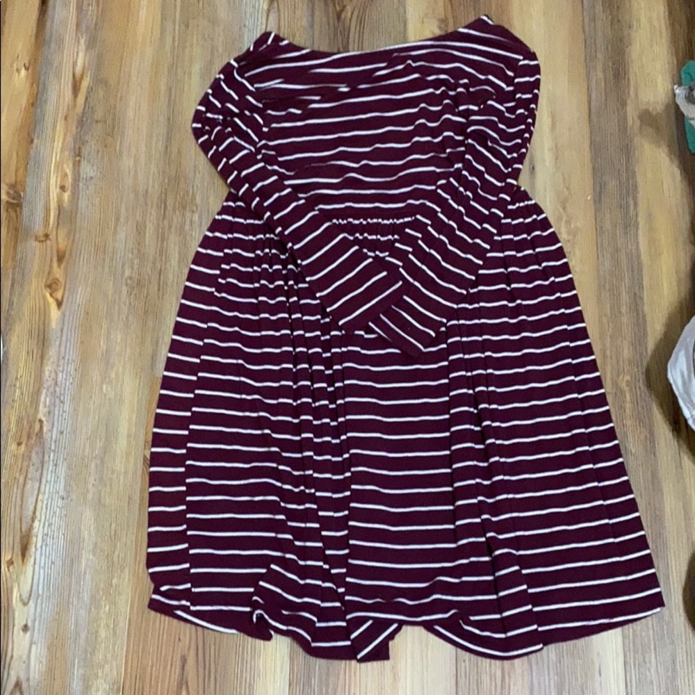 A maroon and white striped dress